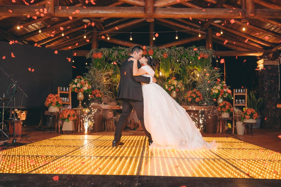 Happy couple sharing their first wedding dance